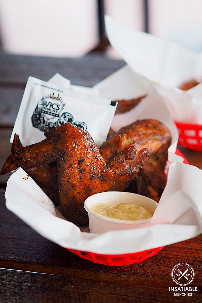 Basket of chicken wings with dipping sauce